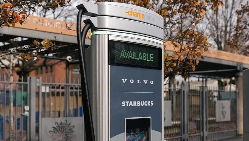 Biznes, dzień sprzedają kawę Teraz wchodzą rynek samochodów elektrycznych! - zdjęcie, fotografia